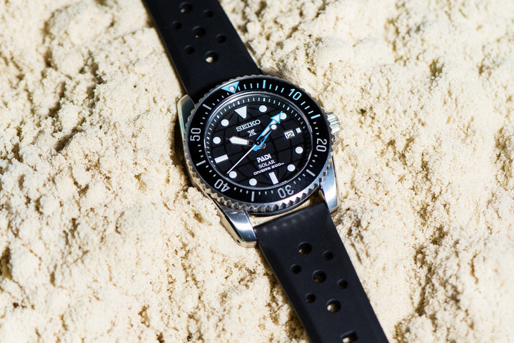 BluShark Straps - Rally Rubber - Black - Two Piece Strap Brushed Stainless Steel Buckle on the beach